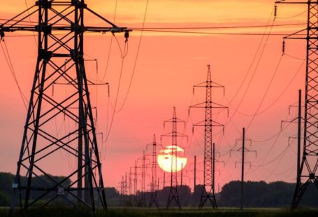 Power Lines - silhouette of electric post during sunset
