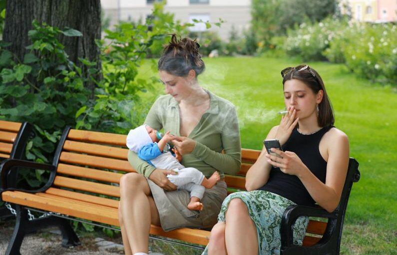 Damage Prevention - two women sitting on a bench with a baby
