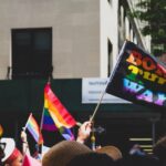 Rights Responsibilities - people holding flaglets near building