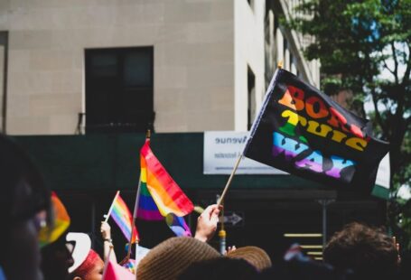 Rights Responsibilities - people holding flaglets near building