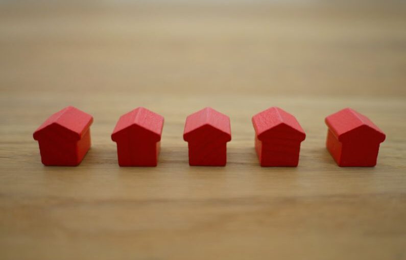 Homeowner Guide - red blocks on brown wooden table