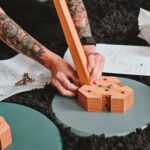 Diy Irrigation - a person drawing on a piece of paper