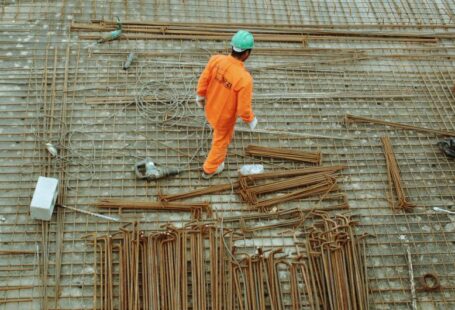 Construction Protection - man walking on construction site