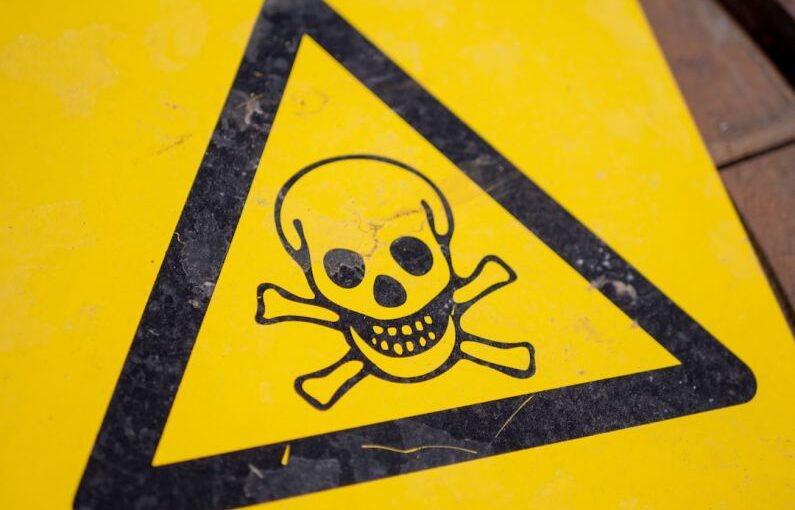 Danger Sign - black and yellow poison sign