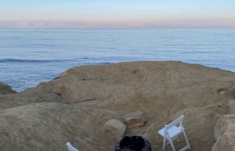 Soil Amendment - a couple of white chairs sitting on top of a rocky beach