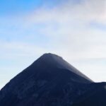 Biodiversity Trees - a large mountain with a very tall peak