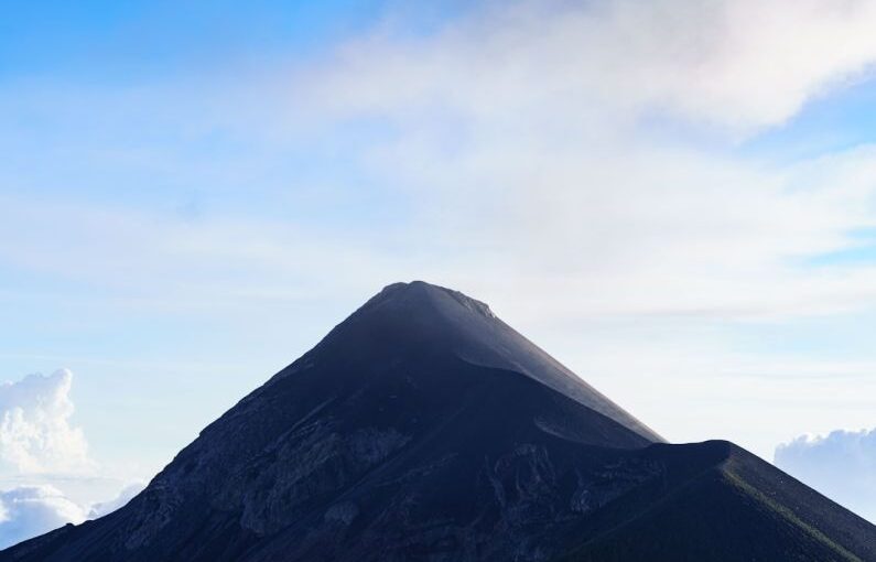 Biodiversity Trees - a large mountain with a very tall peak