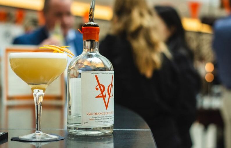 Summer Preparation - selective photography of clear glass bottle on table