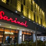 Fall Maintenance - a building with a lit up sign that says sarina