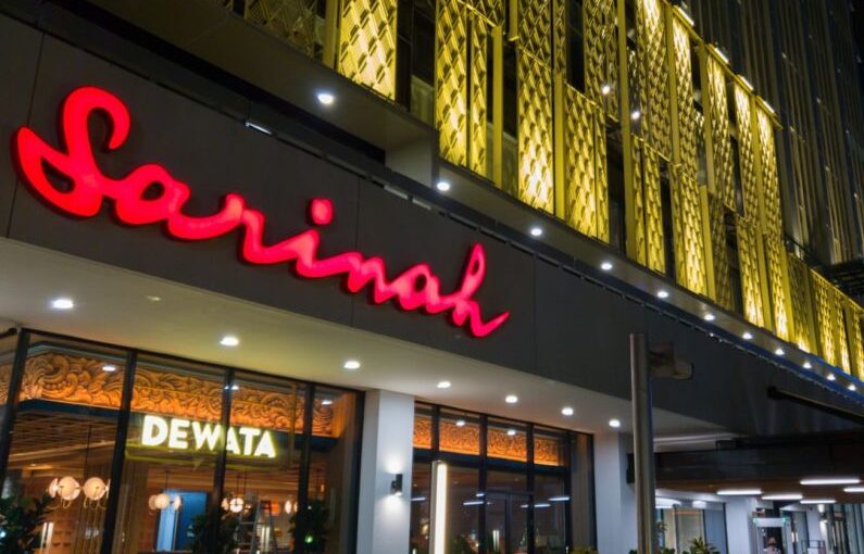 Fall Maintenance - a building with a lit up sign that says sarina