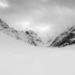 Winterizing Guide - snow covered mountain under cloudy sky during daytime