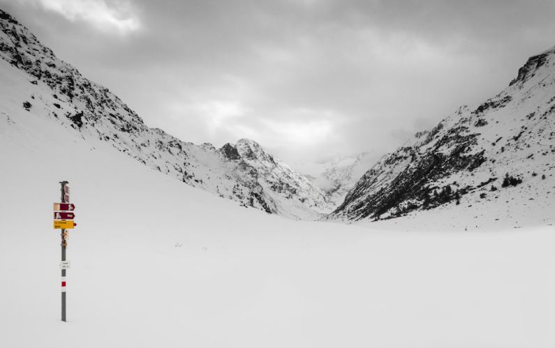 Winterizing Guide - snow covered mountain under cloudy sky during daytime