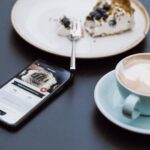 Fertilizing Schedule - teal ceramic teacup on saucer beside black smartphone