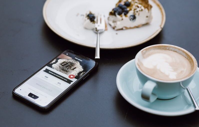 Fertilizing Schedule - teal ceramic teacup on saucer beside black smartphone