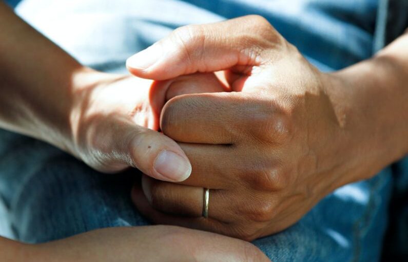 Dormancy Care - person wearing gold wedding band