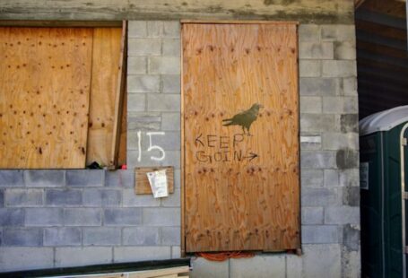 Storm Prep - brown wooden door with i love you print