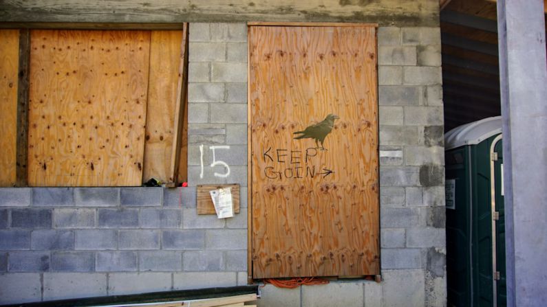 Storm Prep - brown wooden door with i love you print