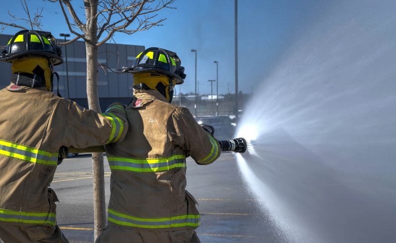 Safety Gear - time lapse photography of two firemen